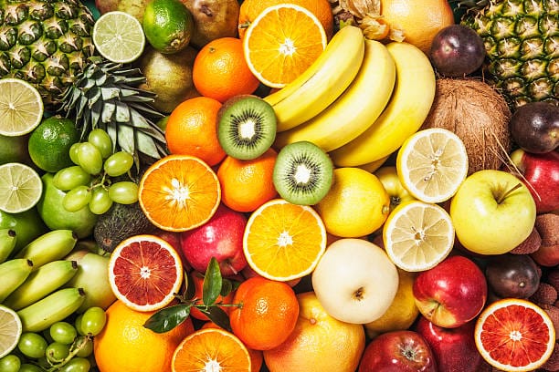 istockphoto-529664572-dd Fresh fruit background. Healthy eating and dieting concept. Winter assortment. Top view